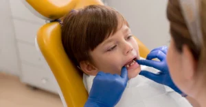 difference between pulpotomy and pulpectomy